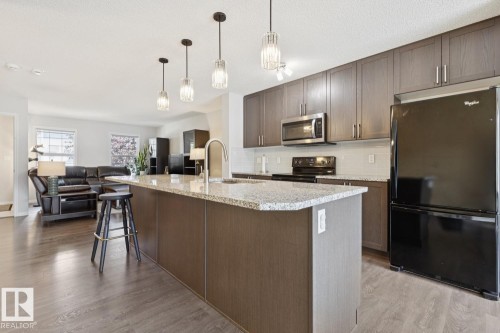 8060 Evans Crescent Nw, Edmonton, AB - Indoor Photo Showing Kitchen With Upgraded Kitchen