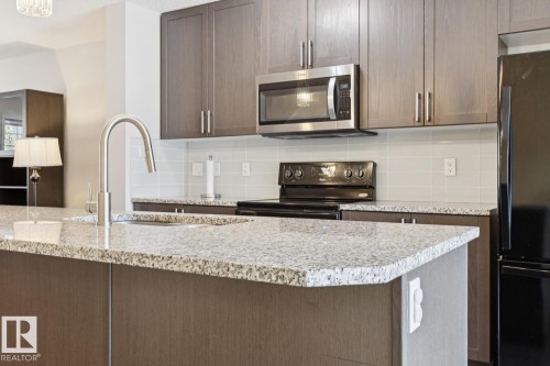 8060 Evans Crescent Nw, Edmonton, AB - Indoor Photo Showing Kitchen With Upgraded Kitchen