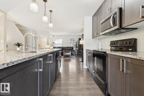 8060 Evans Crescent Nw, Edmonton, AB - Indoor Photo Showing Kitchen With Upgraded Kitchen