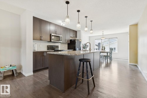 8060 Evans Crescent Nw, Edmonton, AB - Indoor Photo Showing Kitchen With Upgraded Kitchen