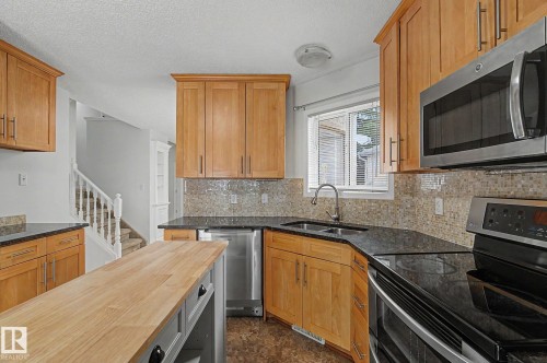 29 Mathias Avenue, Spruce Grove, AB - Indoor Photo Showing Kitchen With Double Sink