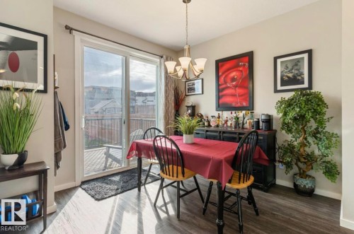 Sliding glass door access to an outdoor deck - 12737 205 Street Nw, Edmonton, AB - Indoor Photo Showing Dining Room