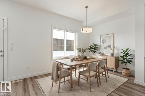 Photo has been virtually staged - 4853 Alwood Point(E) Sw, Edmonton, AB - Indoor Photo Showing Dining Room
