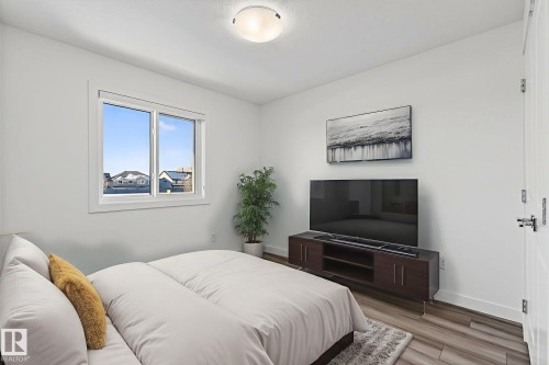 Photo has been virtually staged - 4853 Alwood Point(E) Sw, Edmonton, AB - Indoor Photo Showing Bedroom
