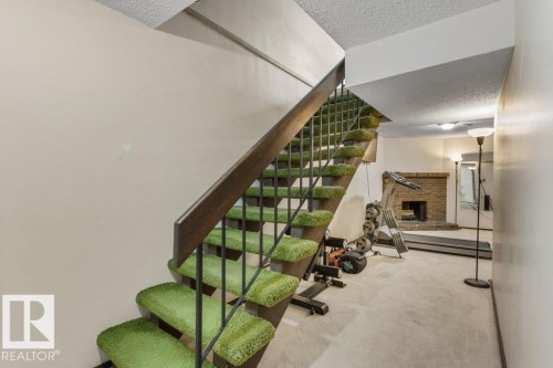 3237 132A Avenue Nw, Edmonton, AB - Indoor Photo Showing Other Room With Fireplace