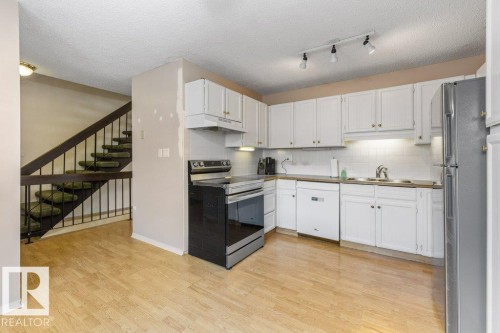 3237 132A Avenue Nw, Edmonton, AB - Indoor Photo Showing Kitchen With Double Sink