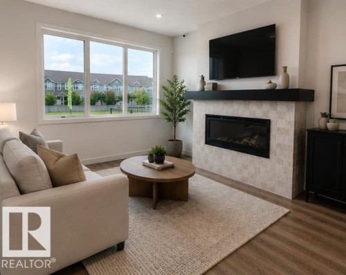 5311 Hawthorn Close Sw, Edmonton, AB - Indoor Photo Showing Living Room With Fireplace