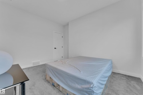 4514 63 Street, Beaumont, AB - Indoor Photo Showing Bedroom