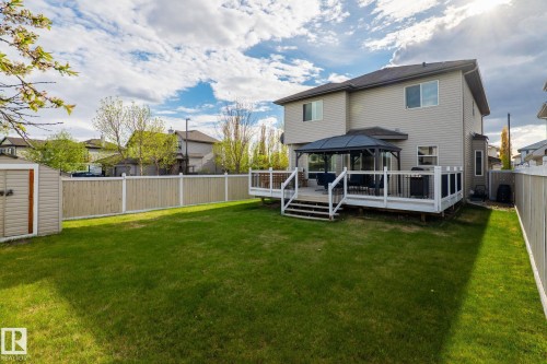 Expansive backyard featuring a large deck, gazebo, and storage shed - 3403 23 Nw, Edmonton, AB - Outdoor With Deck Patio Veranda With Backyard