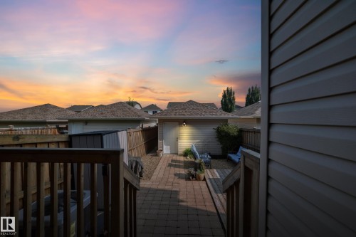 Backyard featuring a paver patio and wood deck - 466 Chappelle Drive Sw, Edmonton, AB - Outdoor With Deck Patio Veranda With Exterior