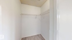 White-painted walls with wood-finish flooring - 