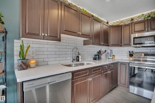 5101 Soleil Boulevard, Beaumont, AB - Indoor Photo Showing Kitchen With Double Sink