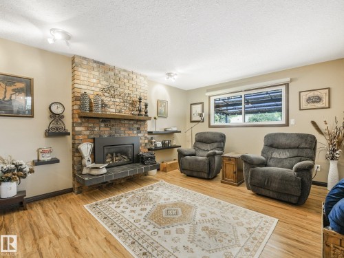 9525 87 Street, Fort Saskatchewan, AB - Indoor Photo Showing Living Room With Fireplace