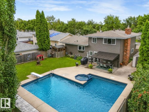 9525 87 Street, Fort Saskatchewan, AB - Outdoor With In Ground Pool With Backyard
