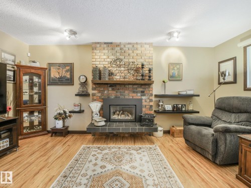 9525 87 Street, Fort Saskatchewan, AB - Indoor Photo Showing Living Room With Fireplace