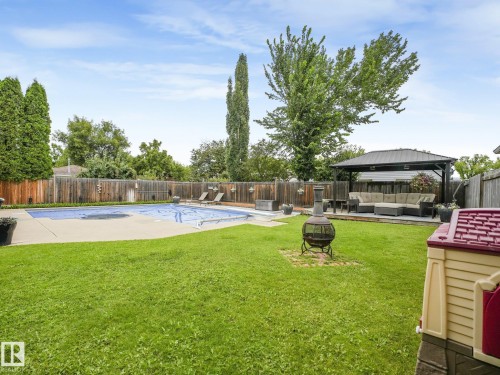 9525 87 Street, Fort Saskatchewan, AB - Outdoor With In Ground Pool With Backyard