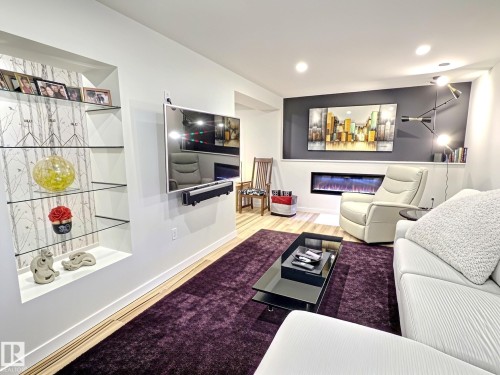 #17 10 Blackburn Dr Sw, Edmonton, AB - Indoor With Fireplace