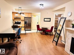 Hardwood-style flooring throughout living areas - 