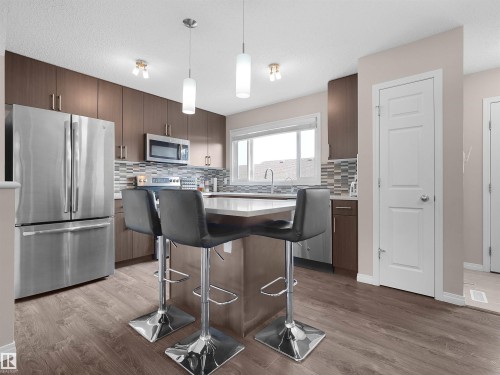 1318 Chappelle Boulevard Sw, Edmonton, AB - Indoor Photo Showing Kitchen With Upgraded Kitchen
