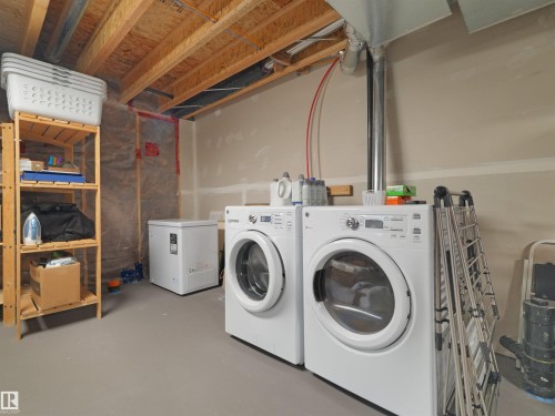 1318 Chappelle Boulevard Sw, Edmonton, AB - Indoor Photo Showing Laundry Room