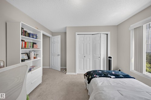 #215 4403 23 St Nw, Edmonton, AB - Indoor Photo Showing Bedroom