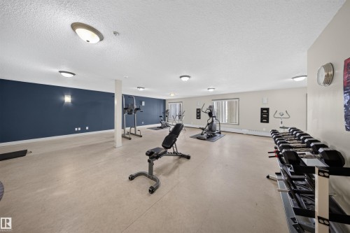 #215 4403 23 St Nw, Edmonton, AB - Indoor Photo Showing Gym Room
