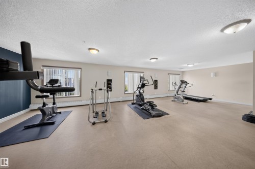 #215 4403 23 St Nw, Edmonton, AB - Indoor Photo Showing Gym Room