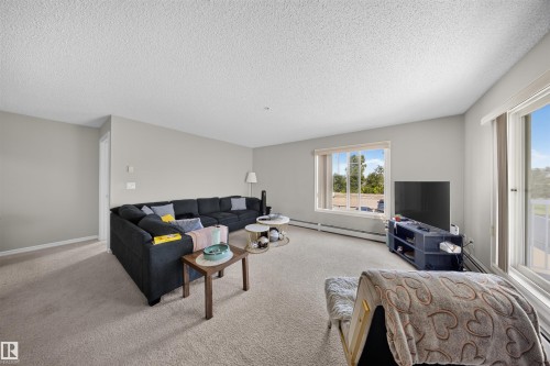 #215 4403 23 St Nw, Edmonton, AB - Indoor Photo Showing Living Room