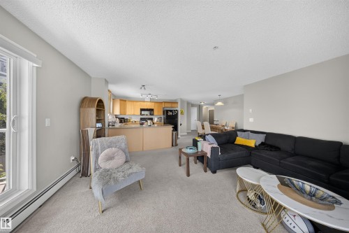 #215 4403 23 St Nw, Edmonton, AB - Indoor Photo Showing Living Room