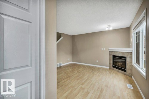 #33 2503 24 St Nw, Edmonton, AB - Indoor With Fireplace