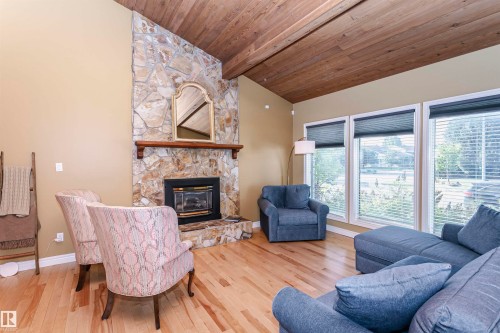 15104 42 Avenue Nw, Edmonton, AB - Indoor Photo Showing Living Room With Fireplace