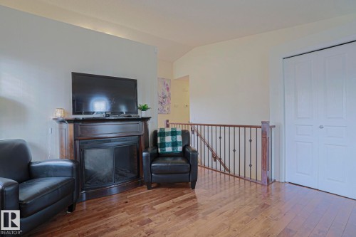 1 Leyland Way, Spruce Grove, AB - Indoor Photo Showing Other Room With Fireplace