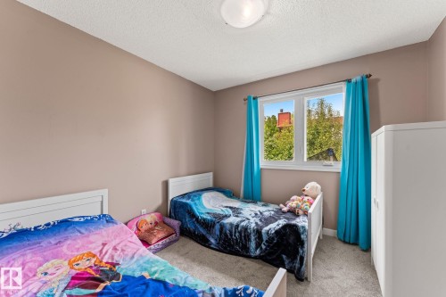Bedroom - 34 Stirling Road Nw, Edmonton, AB - Indoor Photo Showing Bedroom