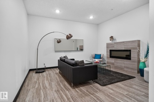 #301 10006 83 Av Nw, Edmonton, AB - Indoor With Fireplace