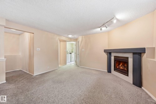2050 Tanner Wynd Nw, Edmonton, AB - Indoor With Fireplace
