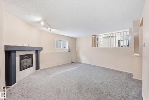 2050 Tanner Wynd Nw, Edmonton, AB - Indoor With Fireplace