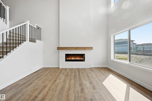 911 18 Avenue Nw, Edmonton, AB - Indoor Photo Showing Living Room With Fireplace