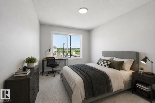 virtually staged - 911 18 Avenue Nw, Edmonton, AB - Indoor Photo Showing Bedroom