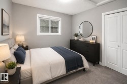 Carpeted flooring, neutral wall color, white trim, and a window with blinds - 