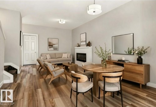 Photo has been virtually staged - 4879 Alwood Point(E) Sw, Edmonton, AB - Indoor With Fireplace