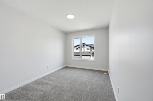 935 18 Avenue Nw, Edmonton, AB - Indoor Photo Showing Other Room