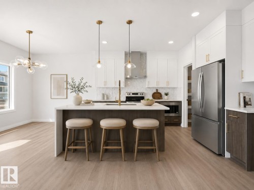 virtually staged - 935 18 Avenue Nw, Edmonton, AB - Indoor Photo Showing Kitchen With Stainless Steel Kitchen With Upgraded Kitchen