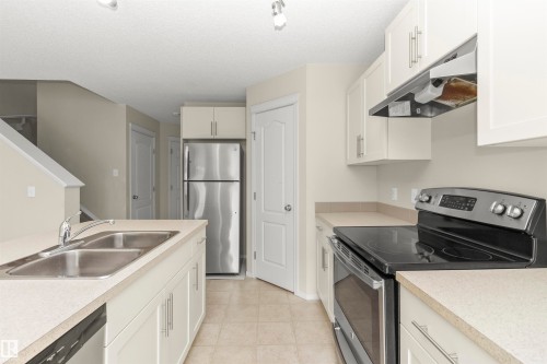 17205 73 Street Nw, Edmonton, AB - Indoor Photo Showing Kitchen With Stainless Steel Kitchen With Double Sink