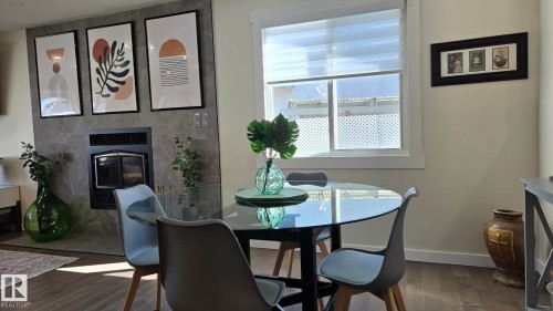 3508 106A Street Nw, Edmonton, AB - Indoor Photo Showing Dining Room With Fireplace
