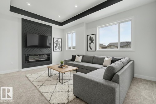 11 Pierwyck Loop, Spruce Grove, AB - Indoor Photo Showing Living Room With Fireplace