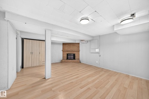 13469 40 Street Nw, Edmonton, AB - Indoor Photo Showing Other Room With Fireplace