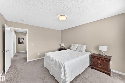 Recessed lighting, neutral wall paint, and plush carpeting - 5147 Crabapple Link Sw, Edmonton, AB - Indoor Photo Showing Bedroom