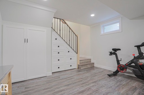 4640 102A Avenue Nw, Edmonton, AB - Indoor Photo Showing Gym Room