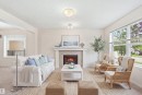 1516 76 Street Sw, Edmonton, AB  - Indoor Photo Showing Living Room With Fireplace 