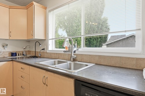 1516 76 Street Sw, Edmonton, AB - Indoor Photo Showing Kitchen With Double Sink